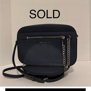 Navy blue crossbody bag.  Excellent condition.